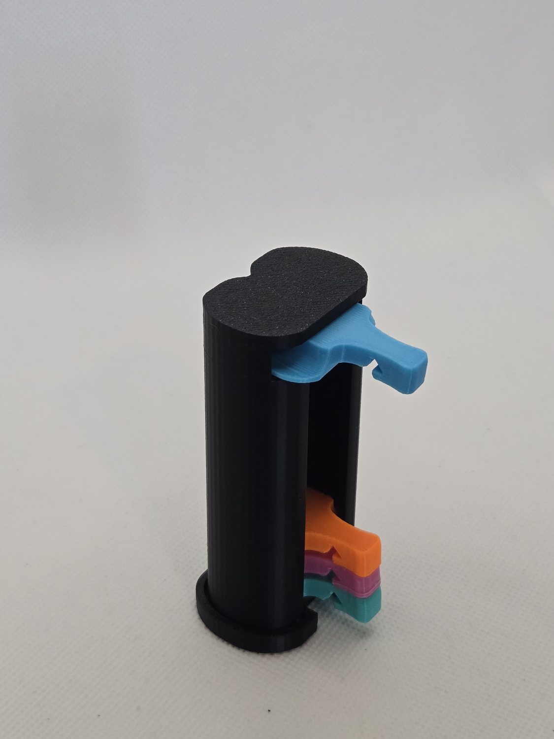 A can cover sliding out of the top of the display container