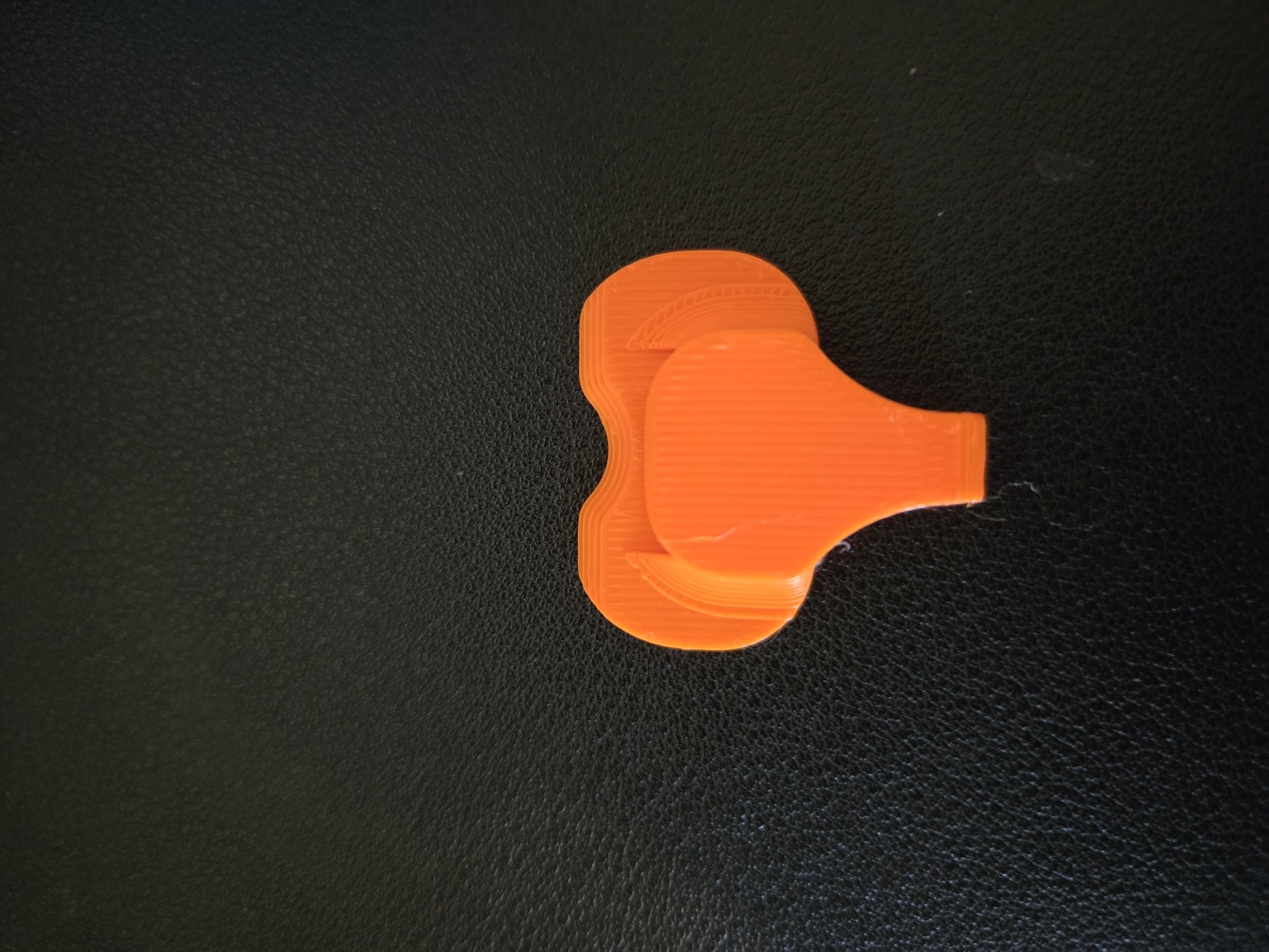 The Elephant Cover — a real orange 3D print